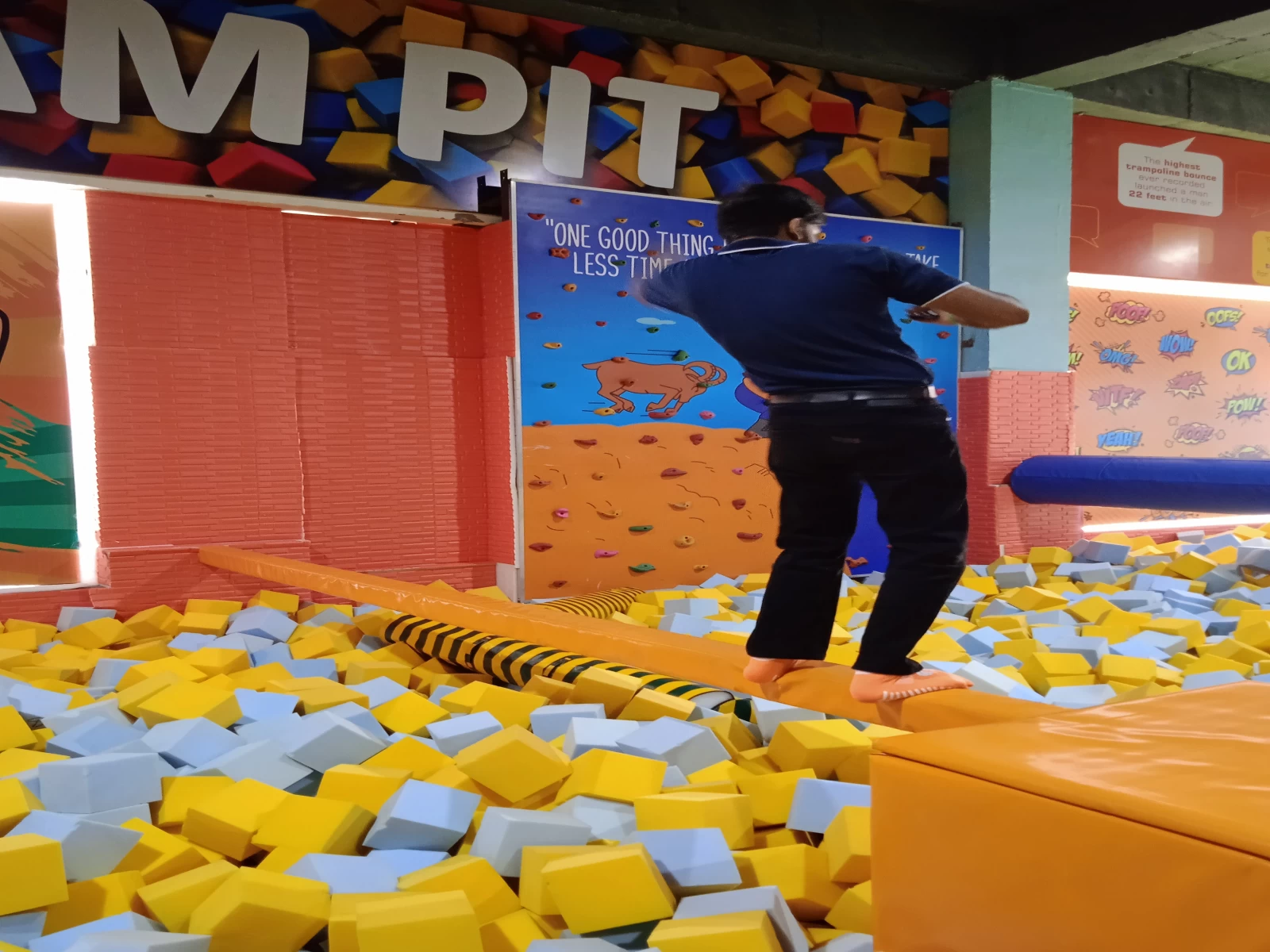 kid playing in foam pit at skyjumper