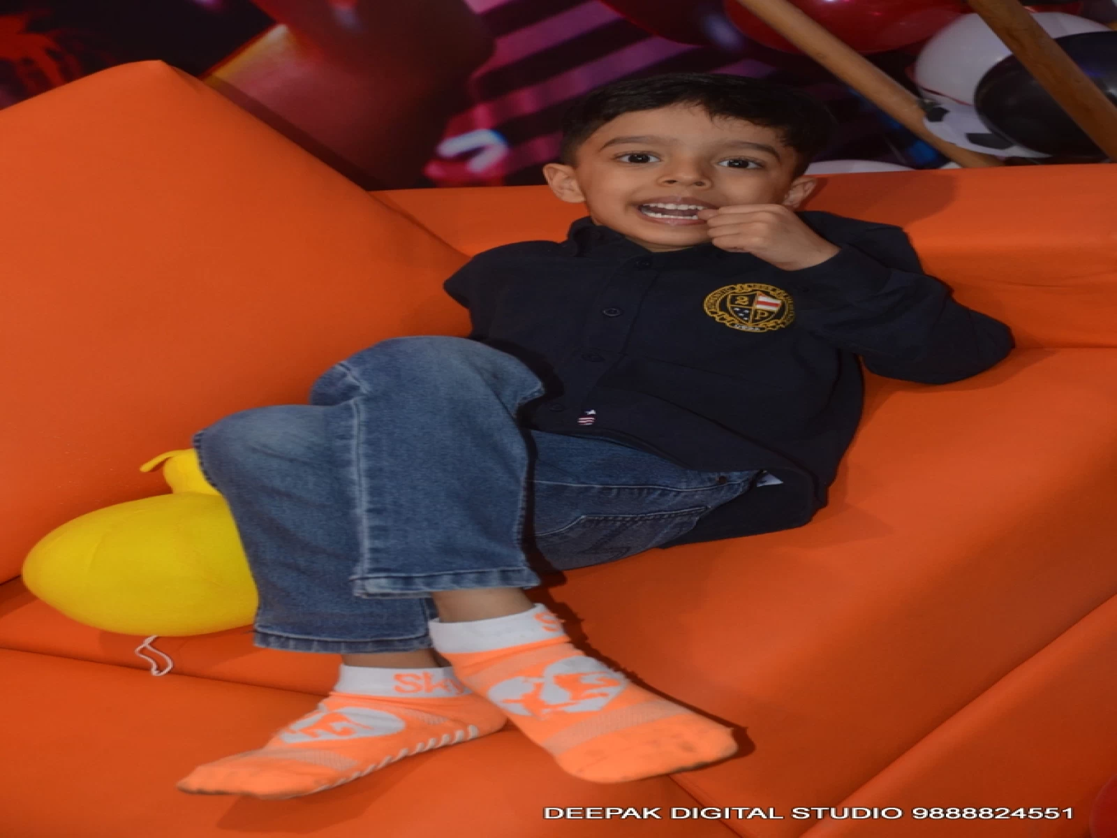 a boy sitting on sofa