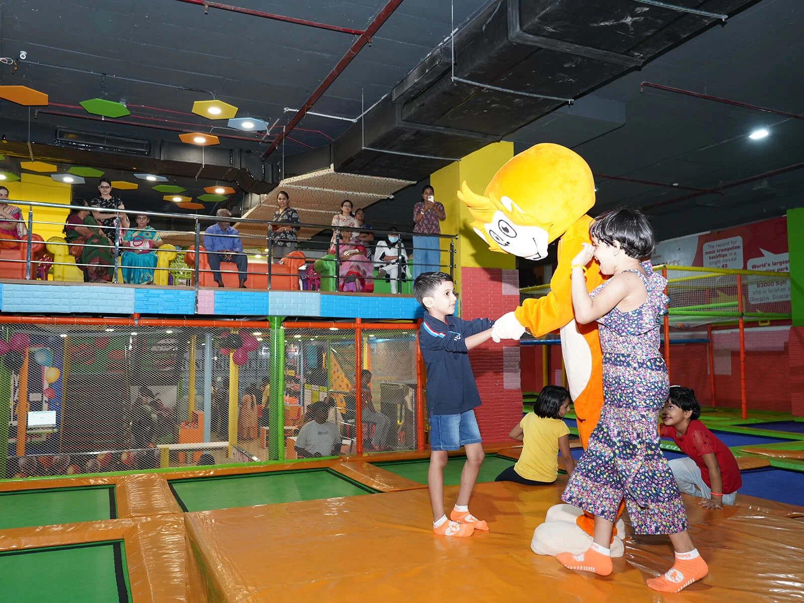 kids playing with chichi at skyjumper