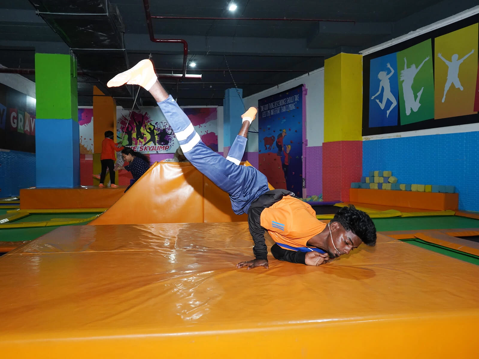 trained staff performing stunts at skyjumper