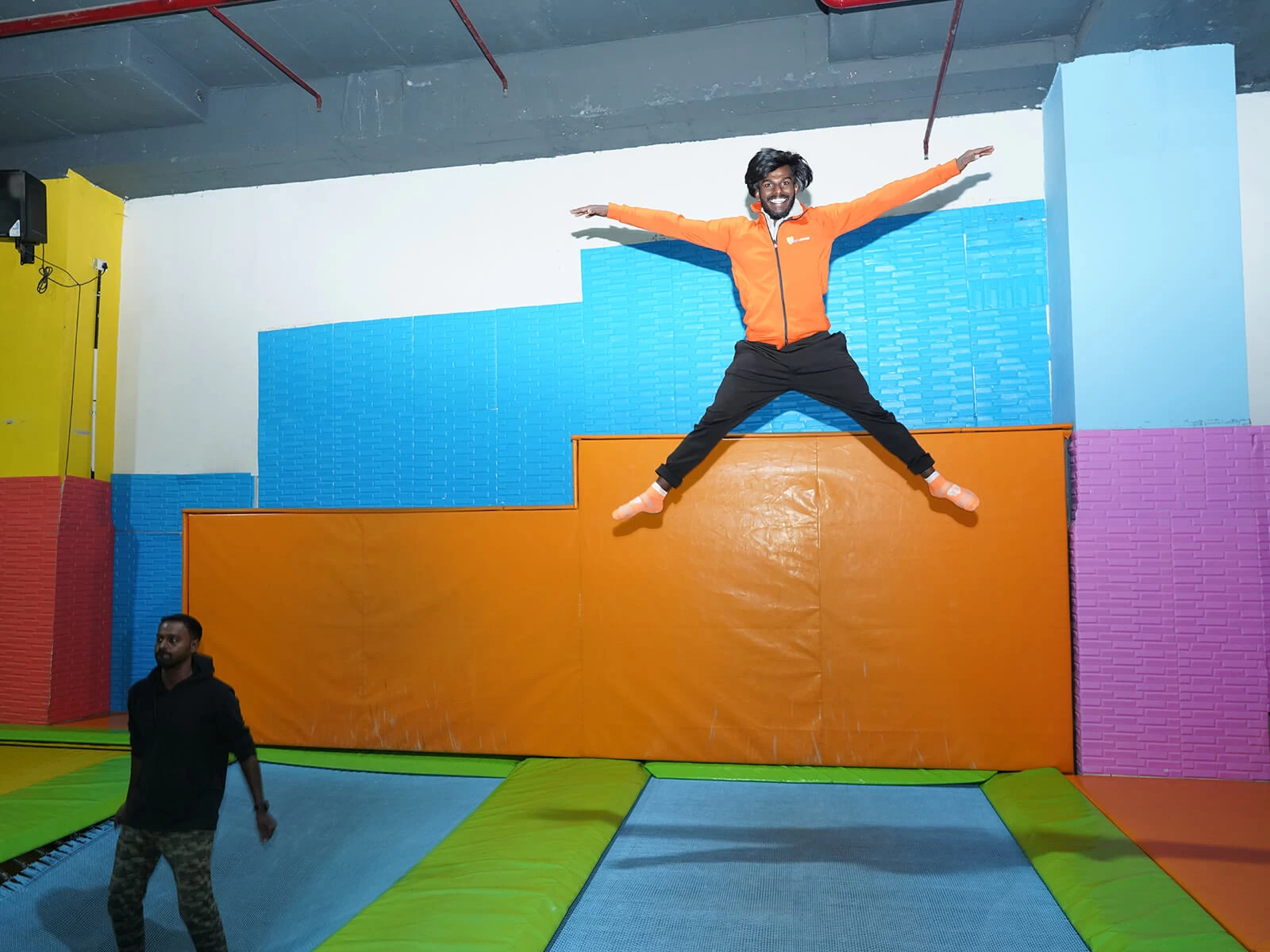 trained staff jumping on trampoline at skyjumper
