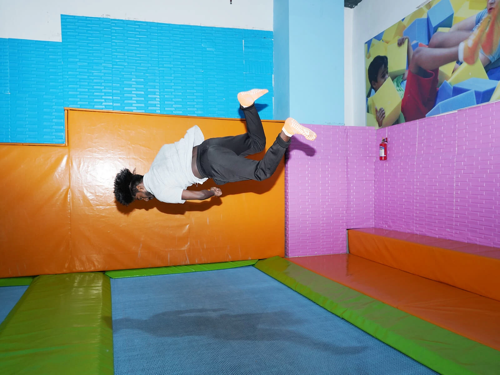 trained staff performing stunts at skyjumper