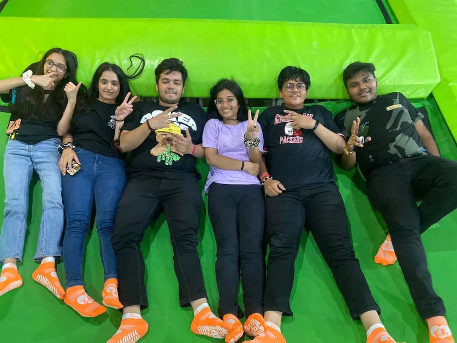 a group of people posing together for a photo