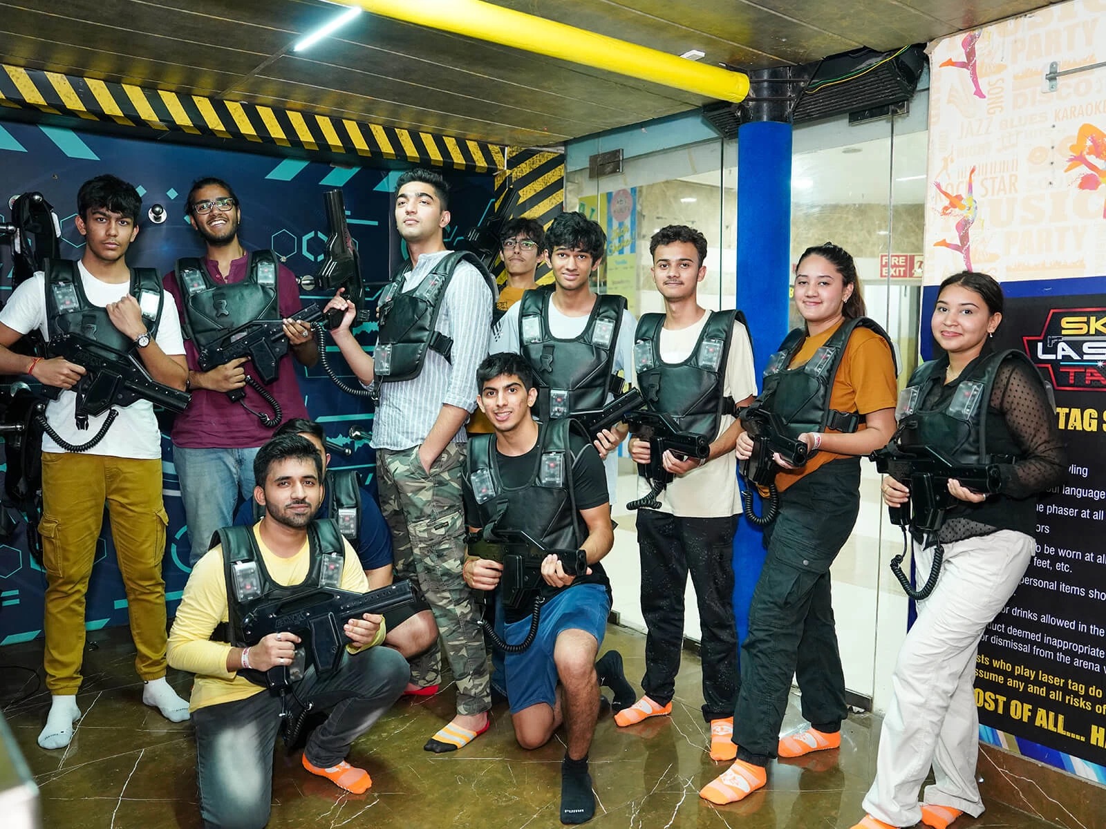 a group of people playing laser tag