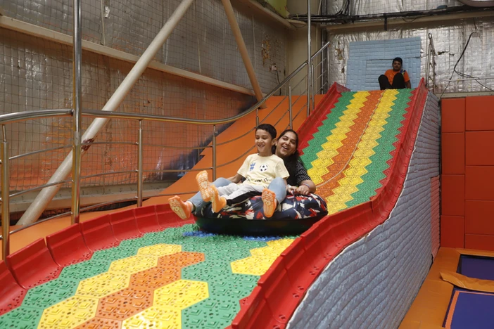 mother and son having fun at skyjumper