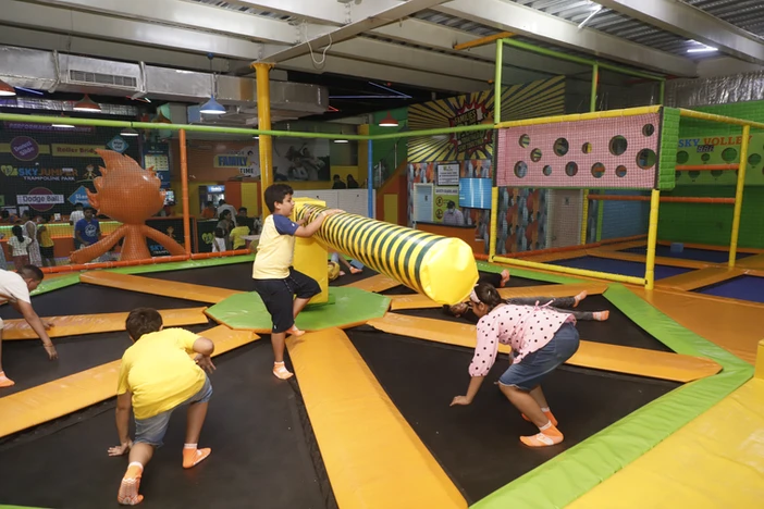 kids playing wipe-out at skyjumper