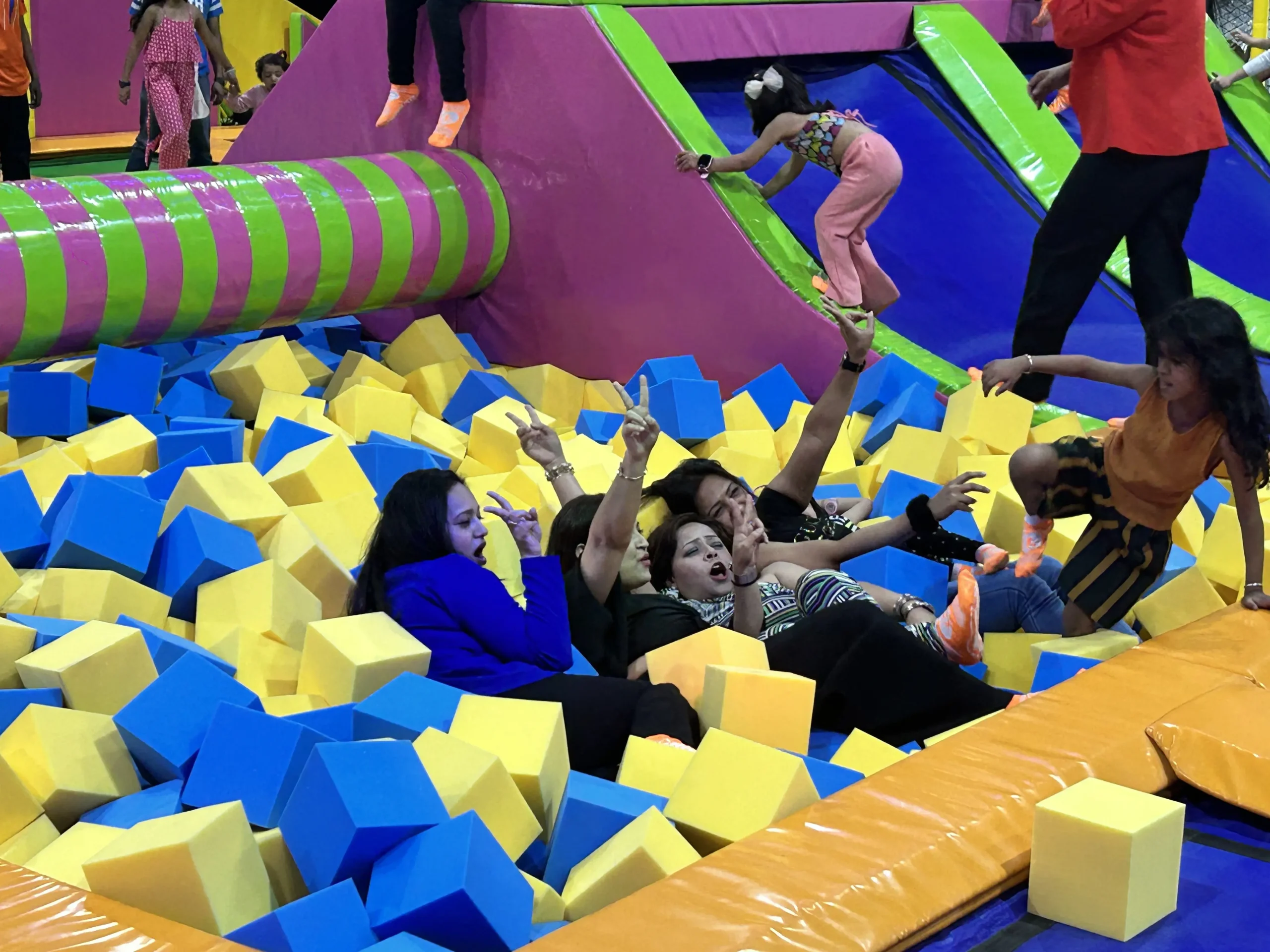 people enjoying in foam pit at ghaziabad skyjumper