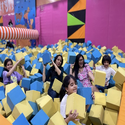 people enjoying in foam pit at skyjumper jammu