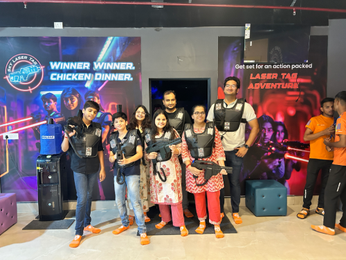 a group of people playing laser tag