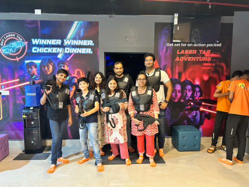 a group of people playing laser tag