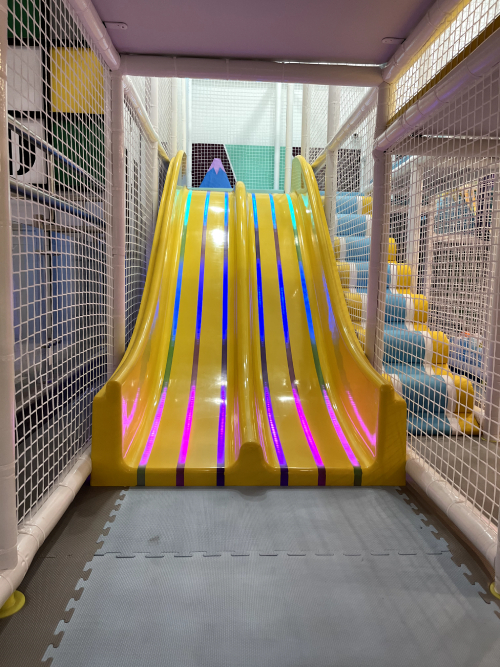 slides in soft play area at skyjumper